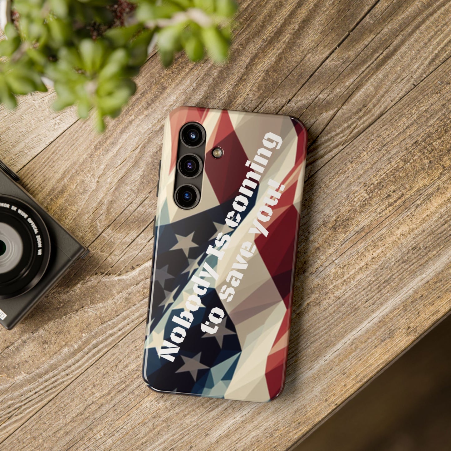 Tough glossy phone case with bold “Nobody Is Coming to Save You” design.