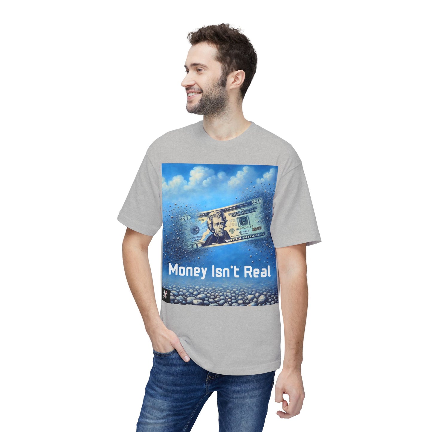 Man wearing a light Unisex ‘Money Isn’t Real’ graphic tee — $20 bill dissolving into pebbles, symbolic design questioning the illusion of money and the real value of time.
