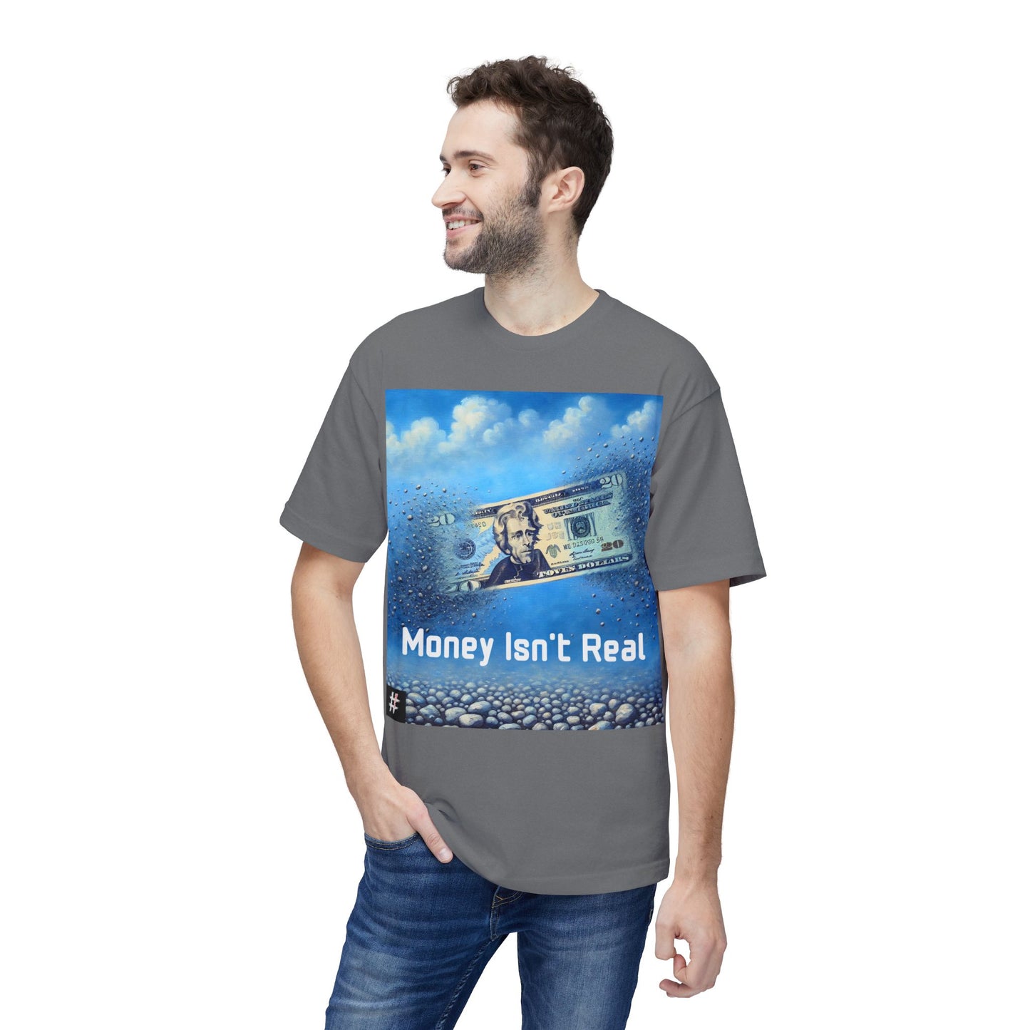 Man wearing a gray Unisex ‘Money Isn’t Real’ graphic tee — $20 bill dissolving into pebbles, symbolic design questioning the illusion of money and the real value of time.