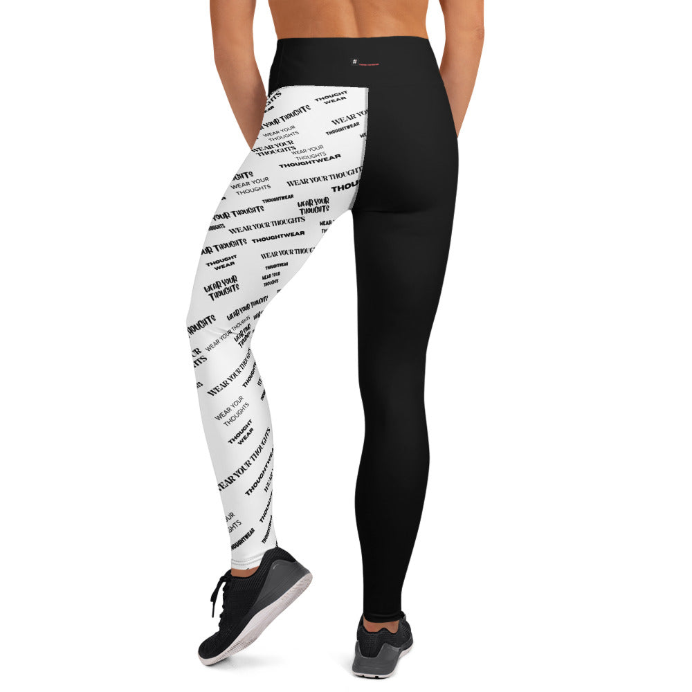A woman wearing Black and white all-over print leggings — women’s activewear expressing confidence, comfort, and strength built from mindset.