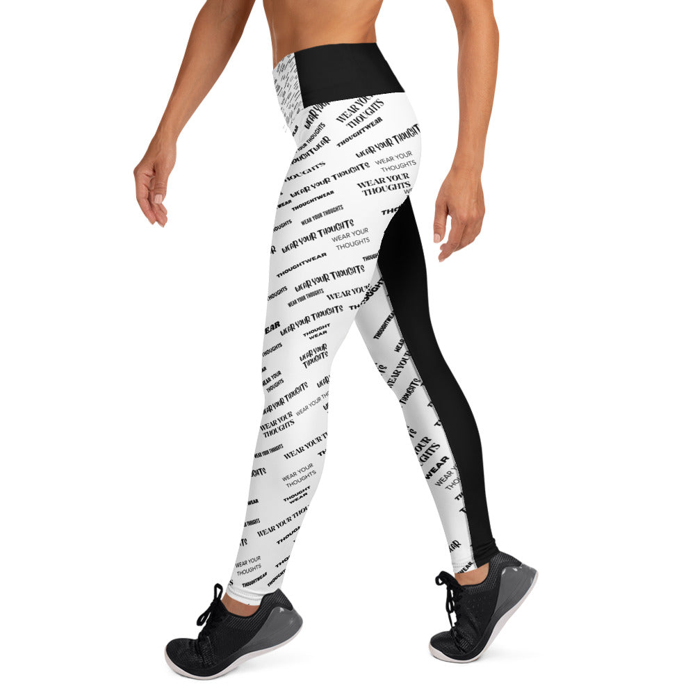 A woman wearing Black and white all-over print leggings — women’s activewear expressing confidence, comfort, and strength built from mindset.