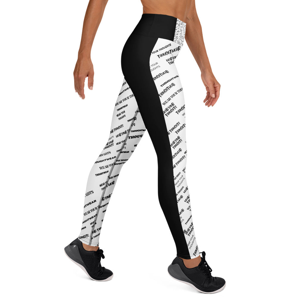 A woman wearing Black and white all-over print leggings — women’s activewear expressing confidence, comfort, and strength built from mindset.
