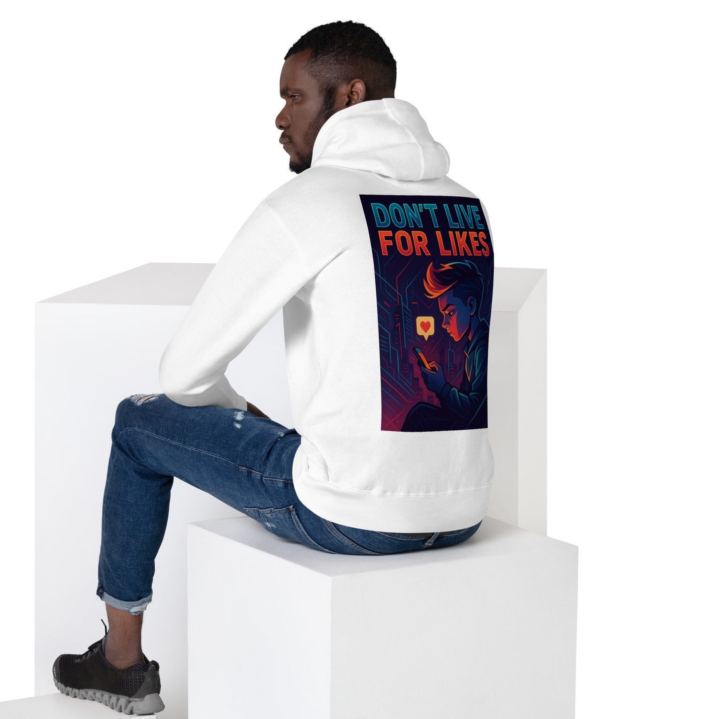 A man wearing a white Don’t Live for Likes slogan hoodie, white back view