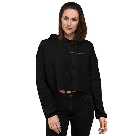 Women’s cropped hoodie with Don’t Live for Likes slogan, black front view